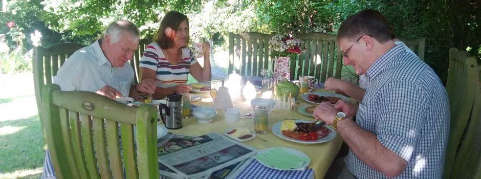Guests enjoying breakfast in the garden