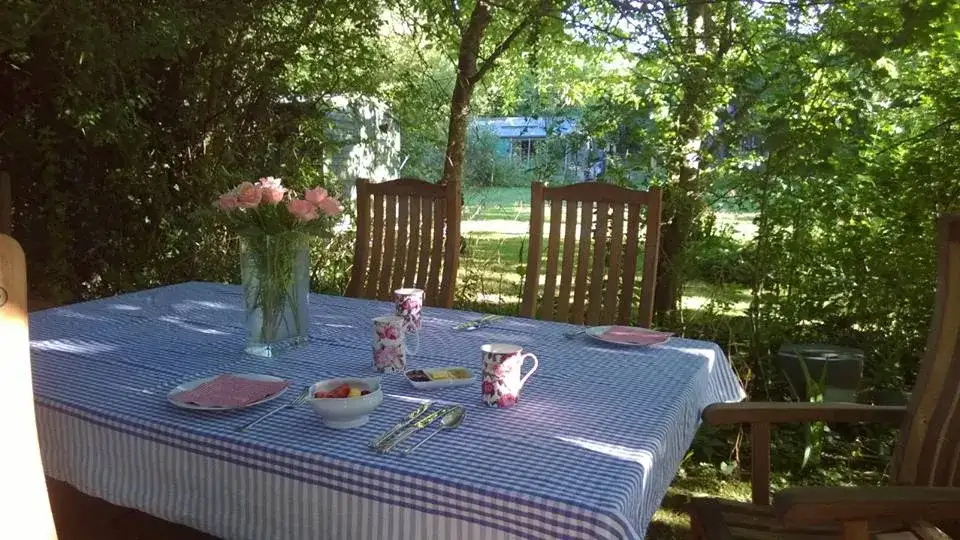 Breakfast table set in the garden